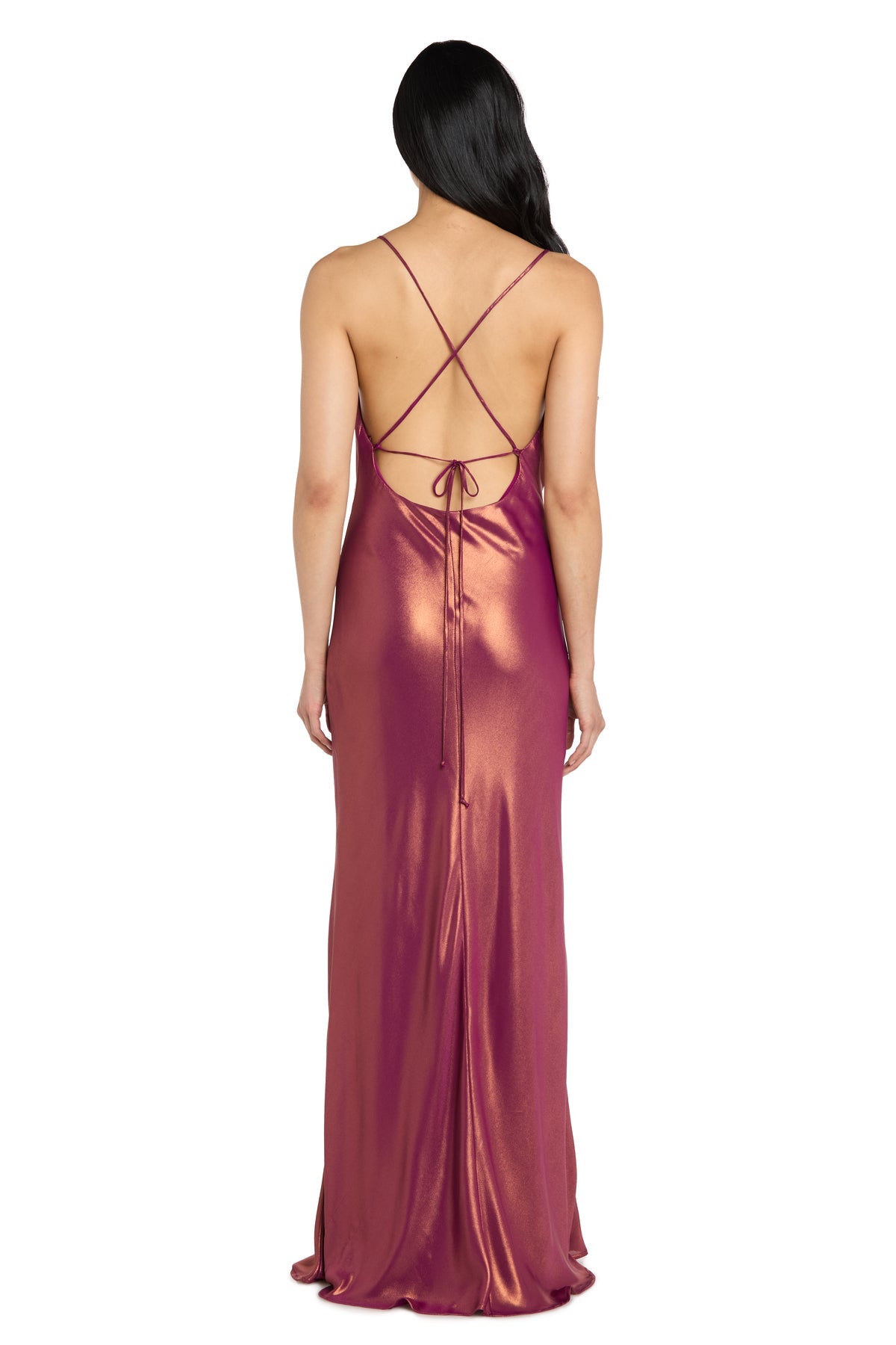 A woman stands with her back to the camera, wearing the Morgan 14010 cowl-neck long satin formal dress in pink, featuring a shiny finish, floor-length design, low open back, and thin crisscross straps.